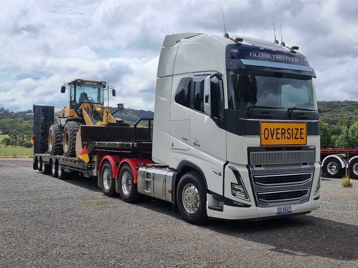 tow truck with farming equipment